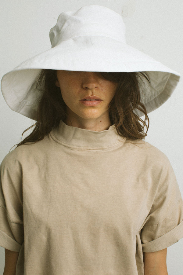 The white floppy hat